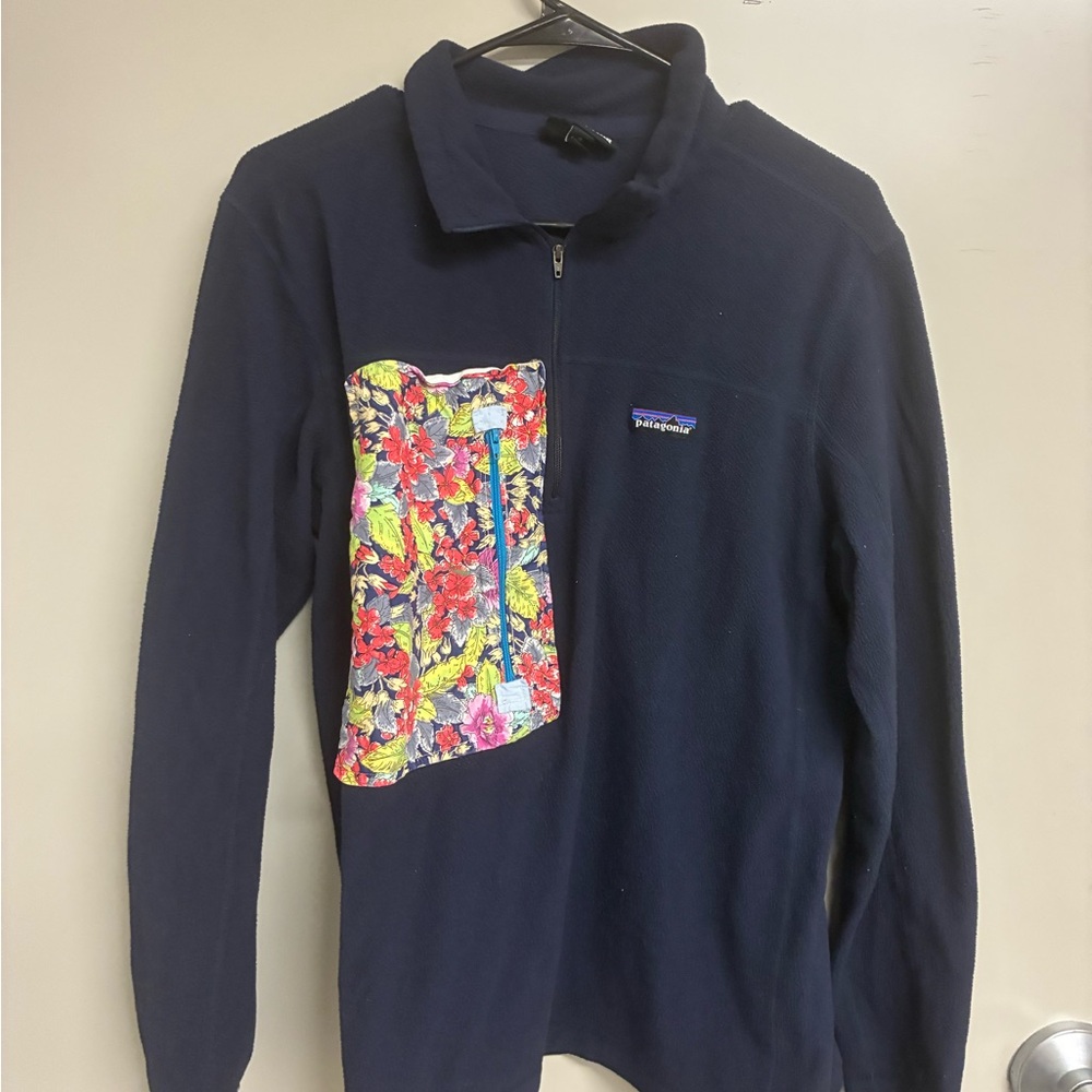 Patagonia Dark Blue Fleece with Colorful Floral Accent